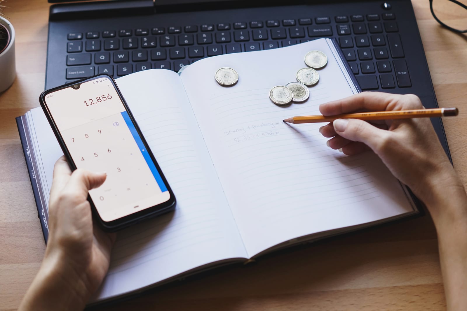 Budget note beside a phone after an Ozow casino deposit